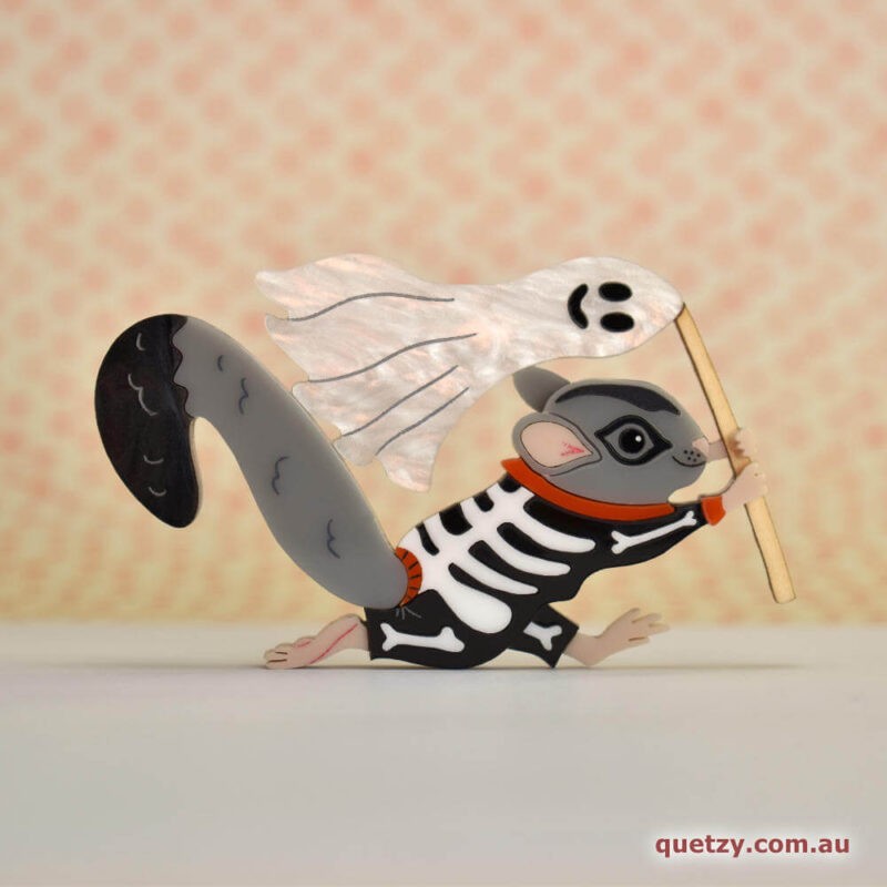 Spooky Squirrel Glider acrylic brooch. Designed, laser cut and handmade by Quetzy.