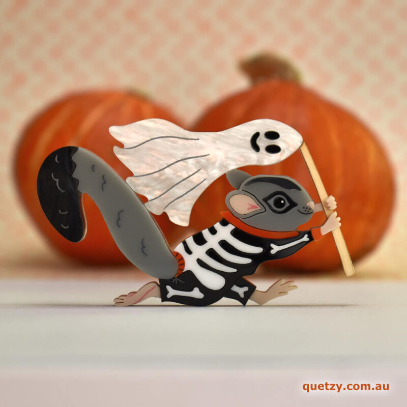 Spooky Squirrel Glider acrylic brooch. Designed, laser cut and handmade by Quetzy.