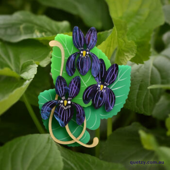 Cluster of Violets. A botanical themed acrylic brooch, designed and handmade by Quetzy.