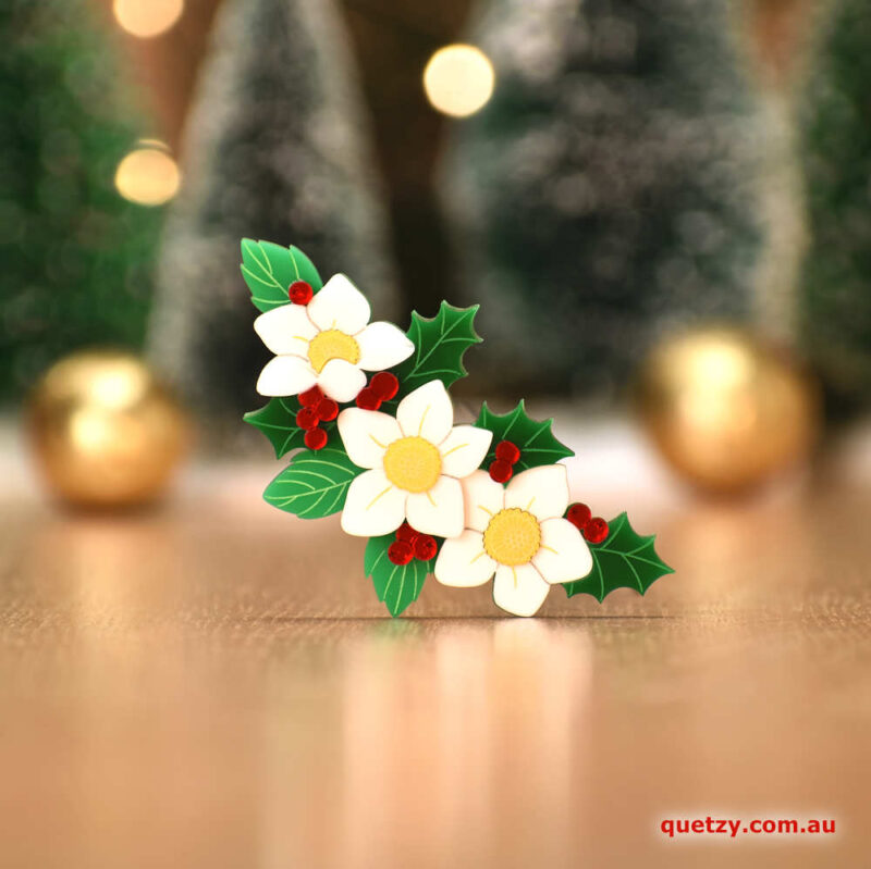 Christmas Rose with Holly & Berries. A botanical themed acrylic brooch, designed and handmade by Quetzy.