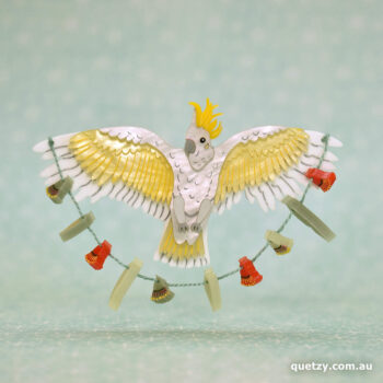 Australian Sulphur-crested Cockatoo. Celebratory acrylic brooch with hangin gum leaf garland